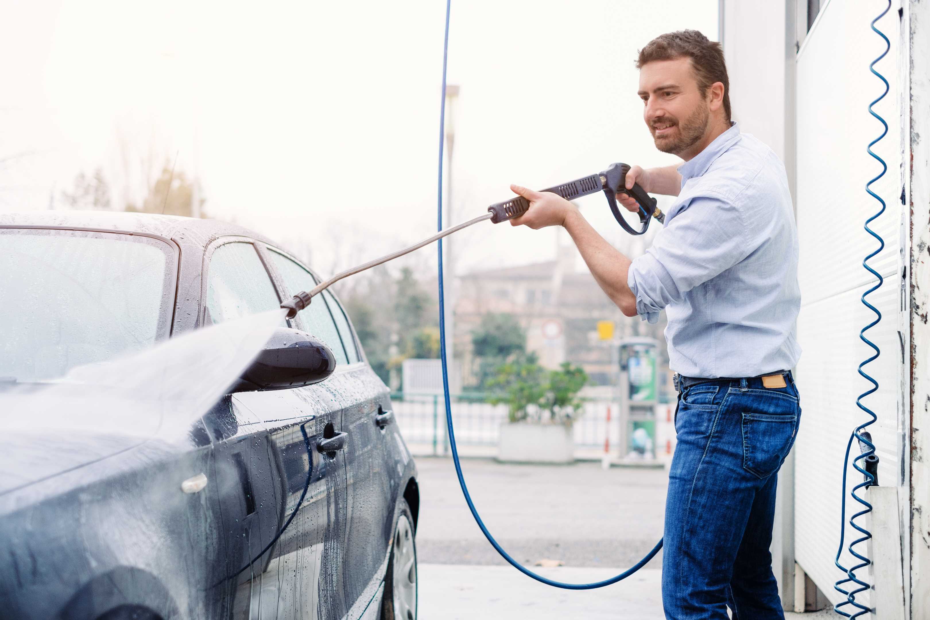 Person is washing his car