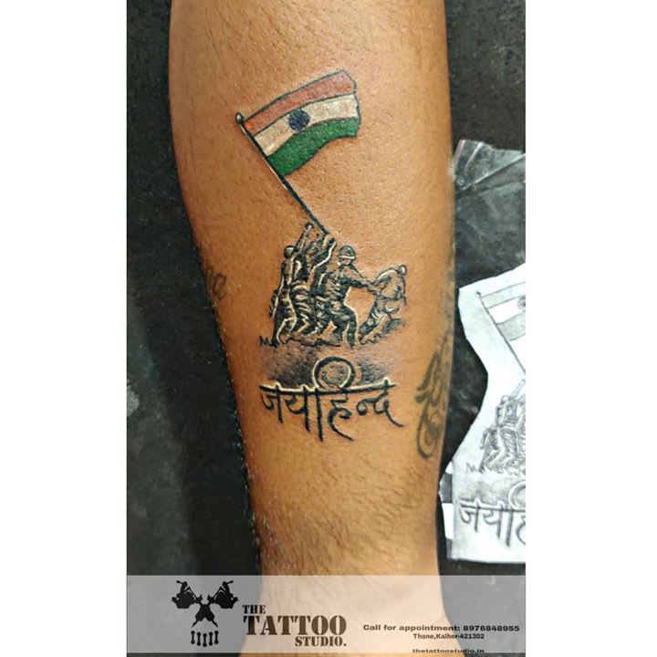 Indian flag tattoo of tri colour painted on persons hand cheering and  celebrating Indian republic day Stock Photo  Alamy