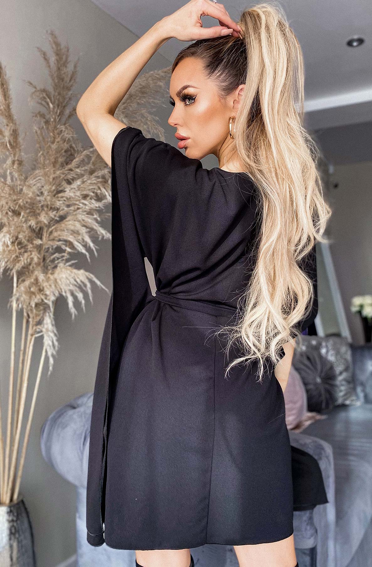 Black batwing belted sales dress