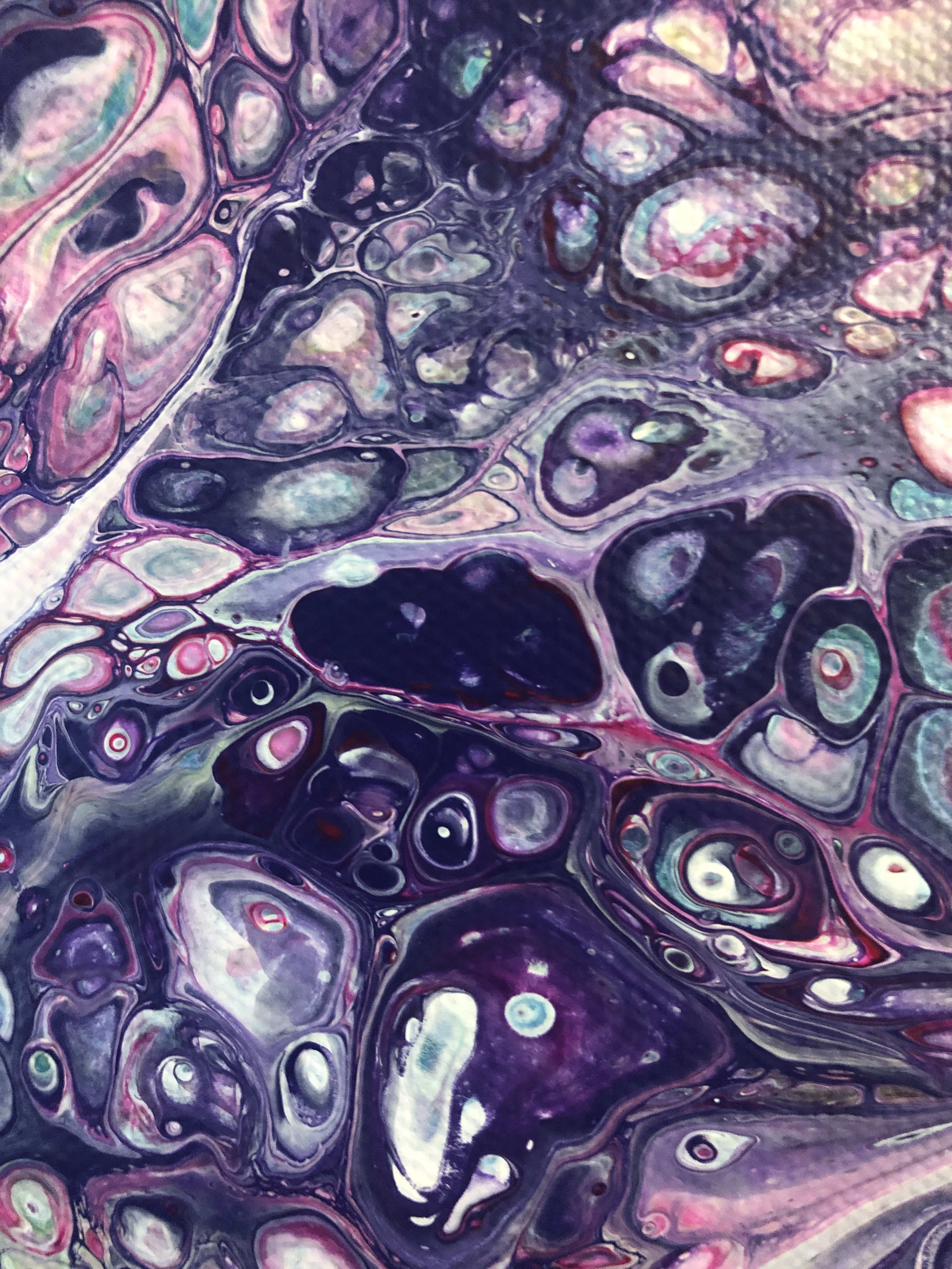 Cosmic Sunrise. Acrylic fluid art pour painting. pink, purple, shops yellow, cranberry, blue, and white.