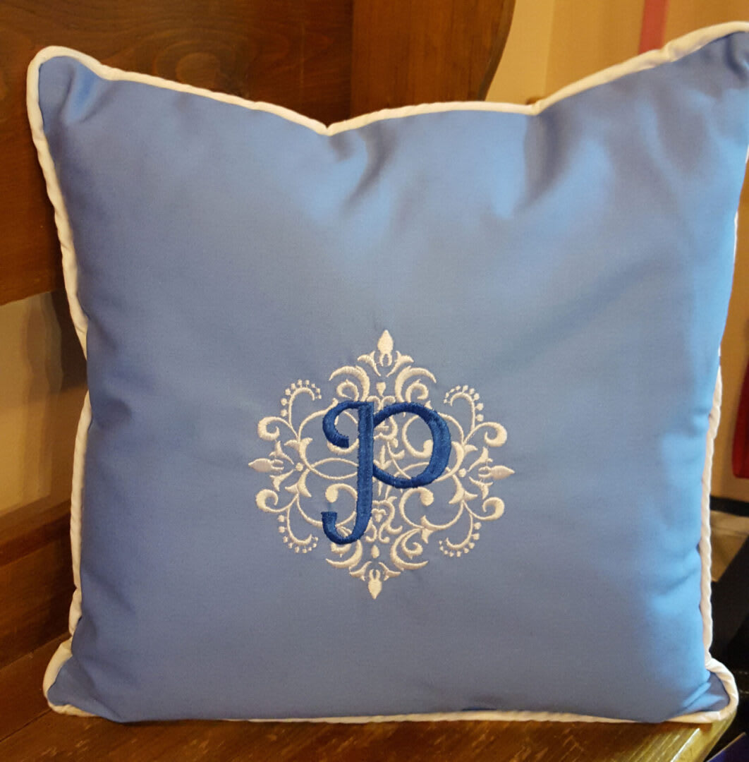 Embroidered initial outlet pillows