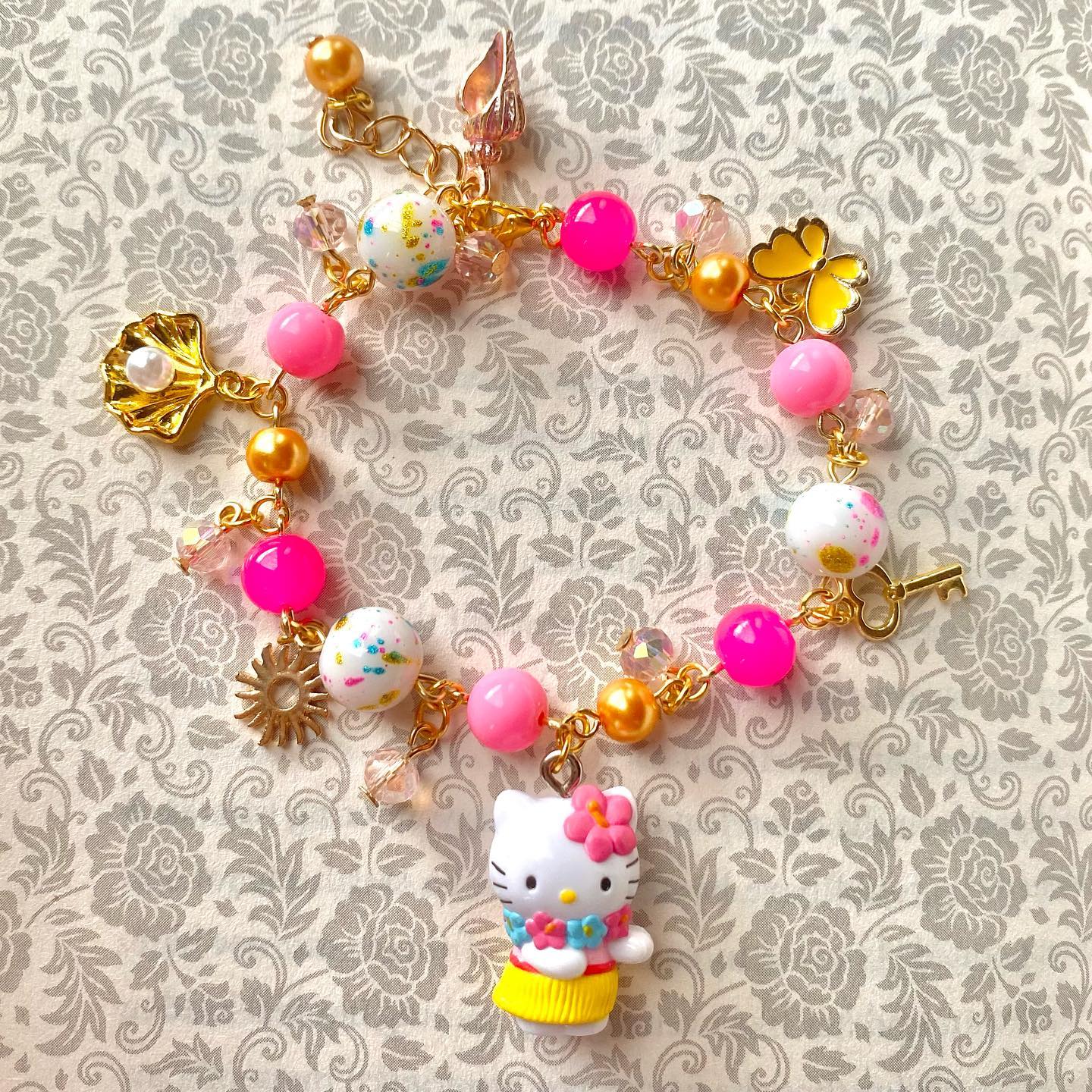 Amazon.com: Hello Kitty Sanrio Womens Bracelet with Flower and Bow Pendants  6.5