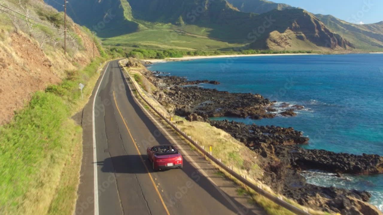 Maui rental car driving a beautiful remote coastal road