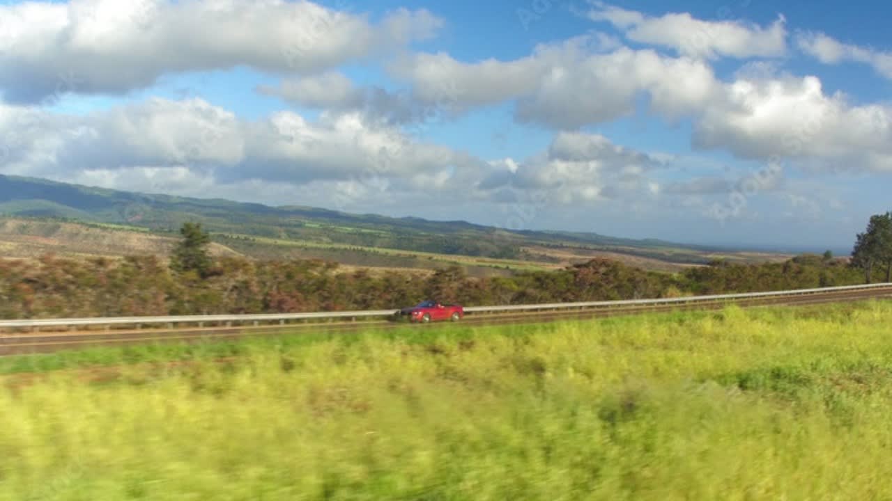 Rental car on scenic rural road