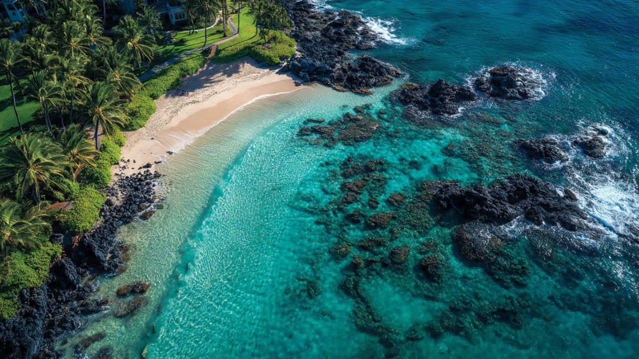 Aerial view of beautiful Maui beach cove.