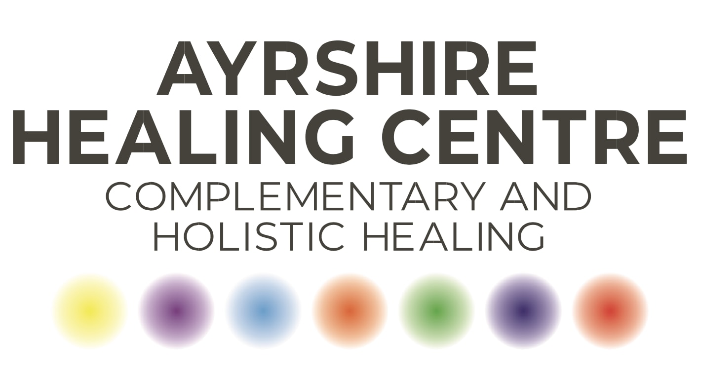Logo for a complementary healing center with colored circles below text.