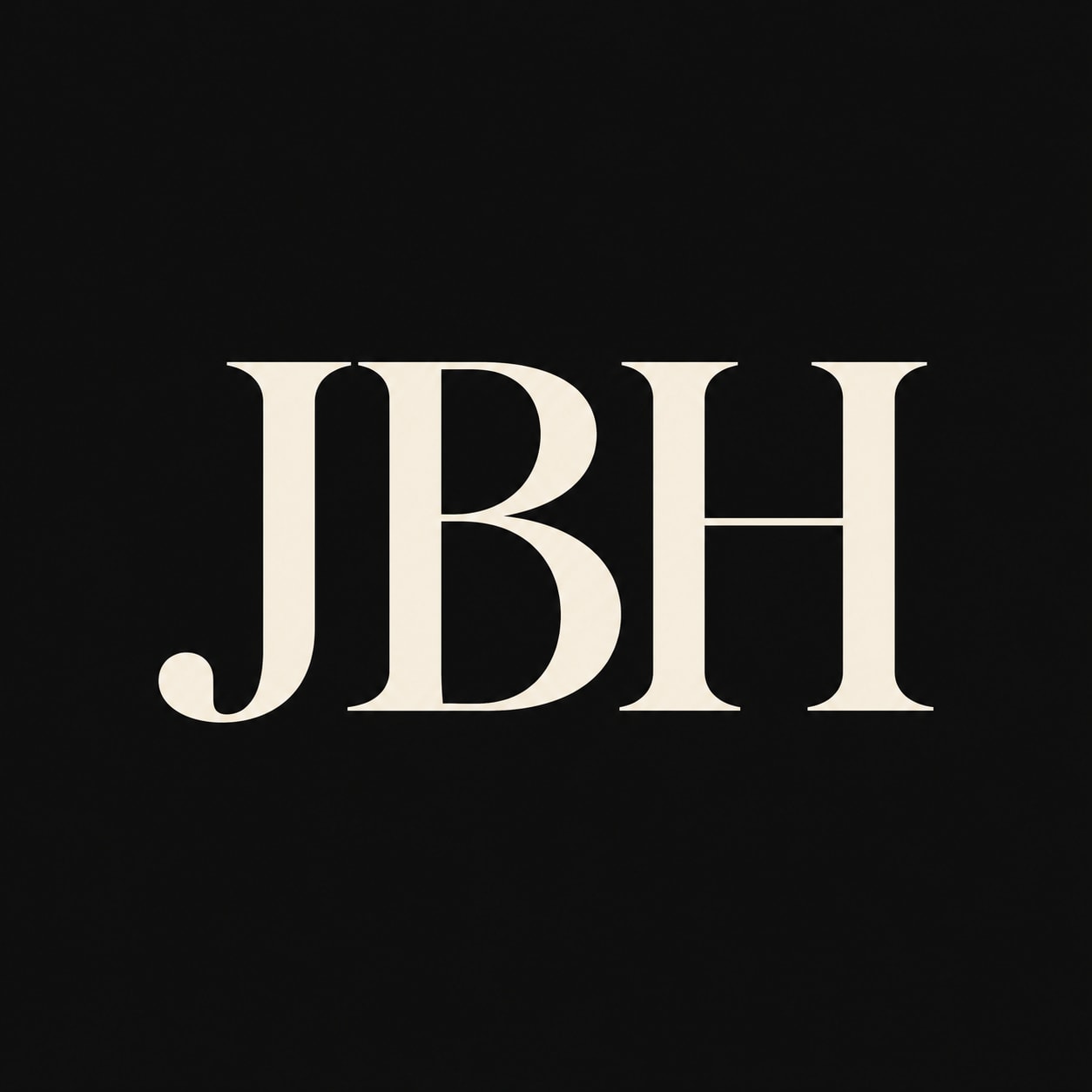 Minimalist logo with cream serif letters on black background