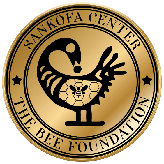 A circular gold emblem with a stylized bird holding a honeycomb.