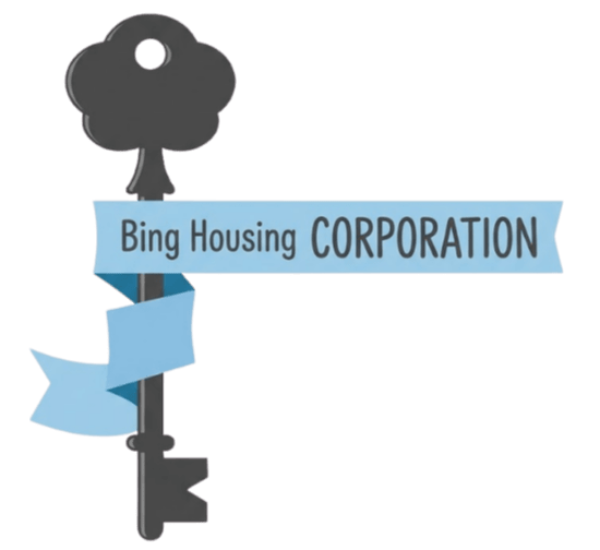 A stylized key with a banner reading 'Bing Housing CORPORATION' on a solid green background.