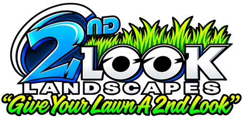 Logo for a landscaping business with stylized grass and bold lettering.